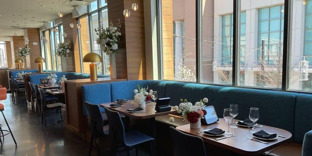 Restaurant booth with wooden accent wall