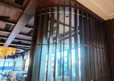 A curved wooden wall feature at Ocean Prime restaurant
