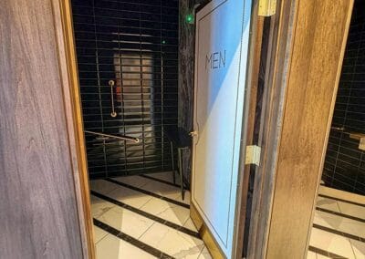 Woodworking around the men's restroom at Ocean Prime restaurant